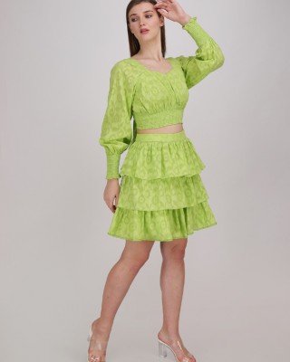 neon green crop top with tier panel short skirt